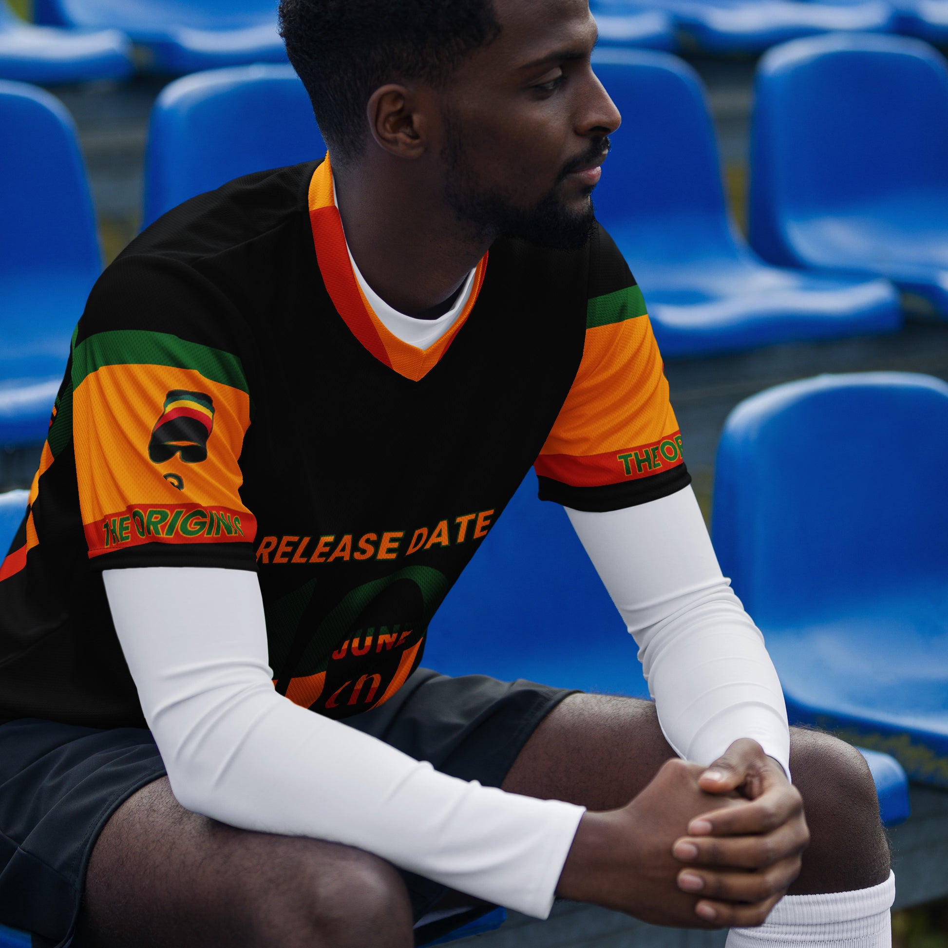 - “Afro-Caribbean jersey with red, gold, and green Rasta colors and number 19 design”