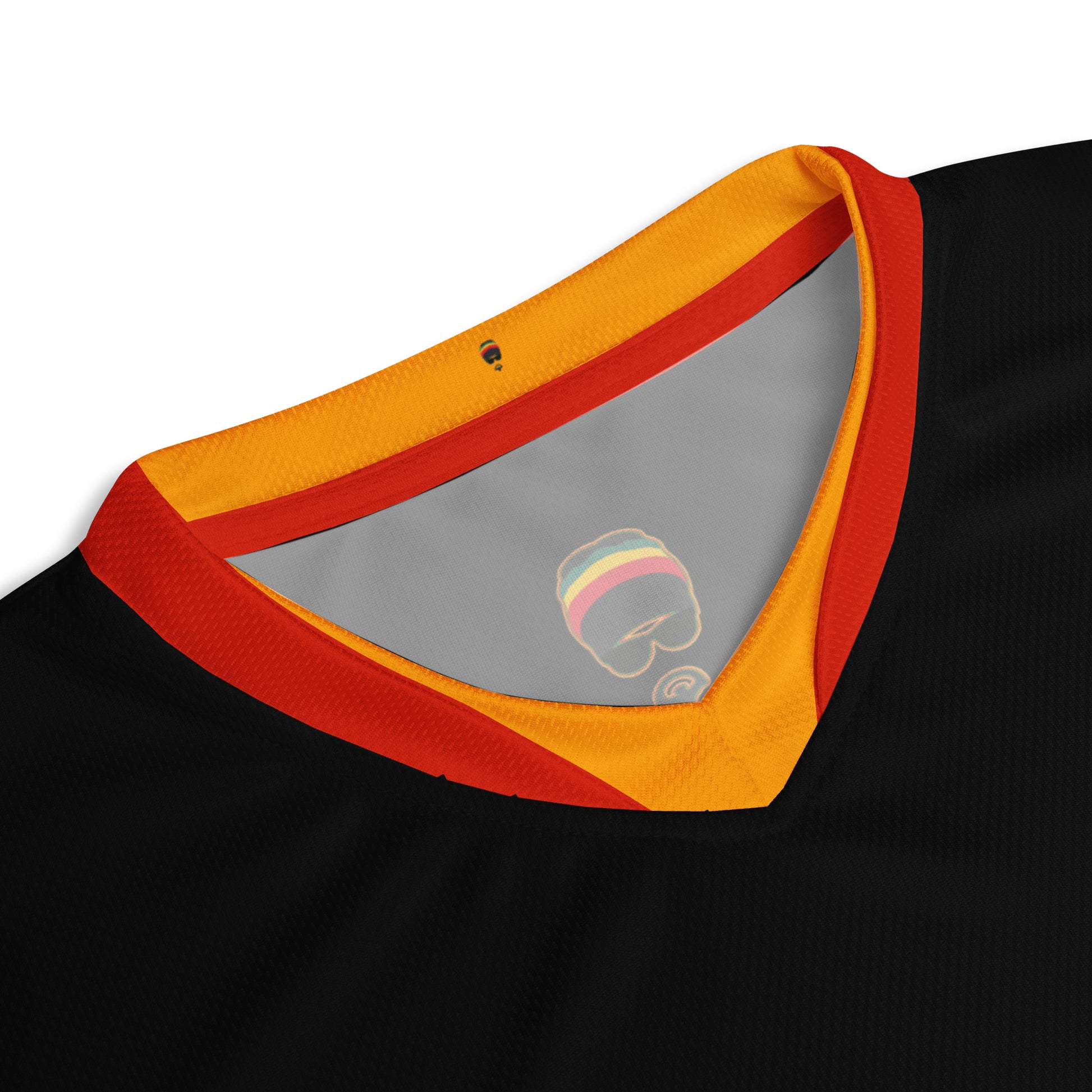 - “Afro-Caribbean jersey with red, gold, and green Rasta colors and number 19 design”